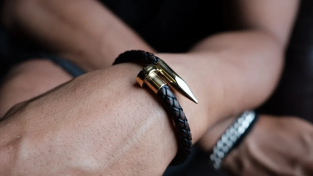 Vòng tay da charm đinh braided-leather-nail bracelet